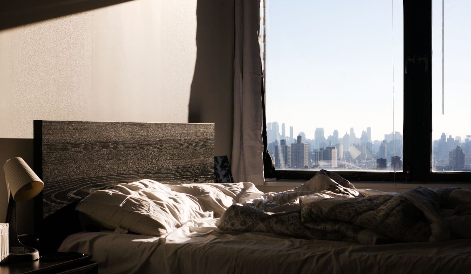 Bedroom window overlooking the New York City skyline